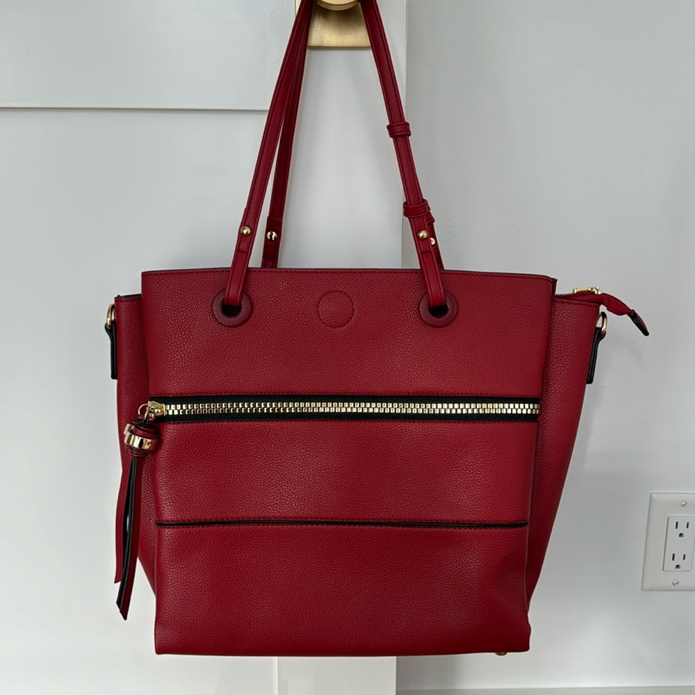 Red faux leather handbag with gold zipper detail - never used.